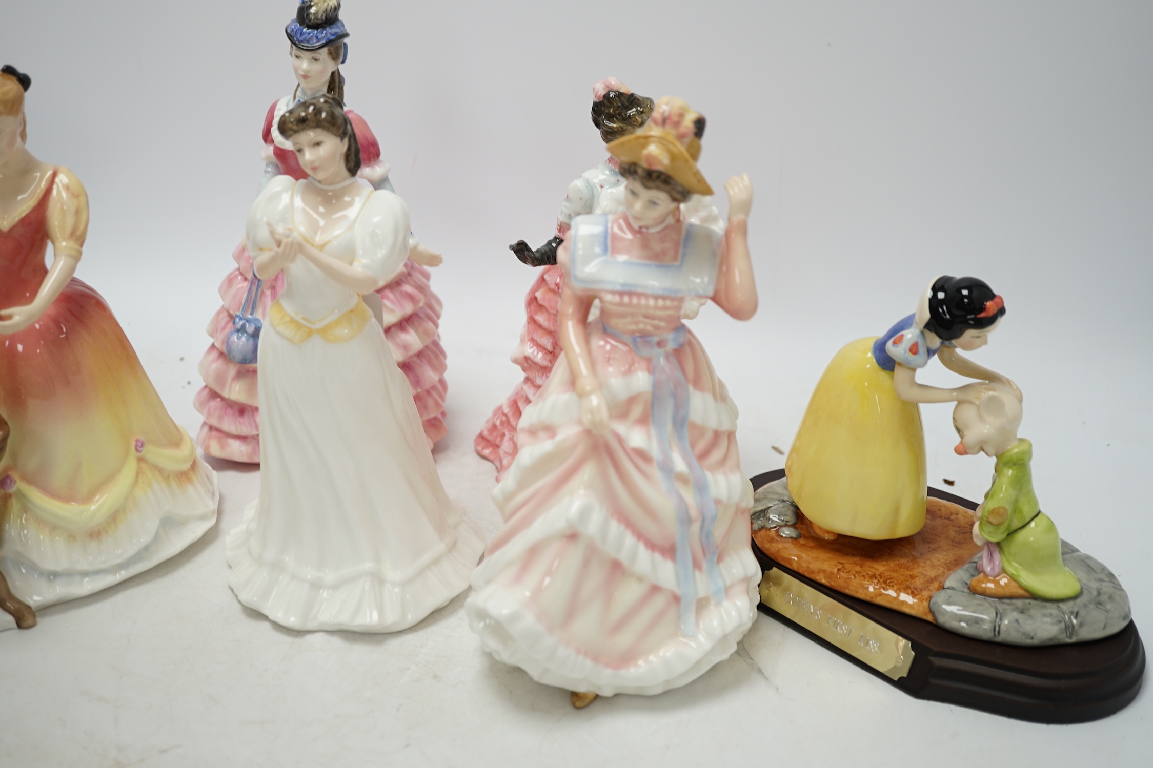 Five Royal Doulton figures including Diane, L’ambitieuse and Sharon, together with a Disney Showcase Collection figure, ‘Dopey’s first kiss’, all boxed. Condition - figures good, boxes poor to fair